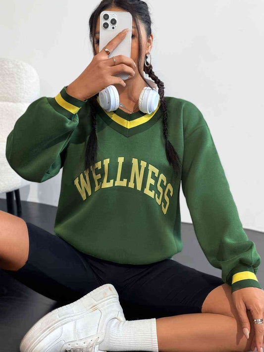 WELLNESS Graphic V-Neck Sweatshirt